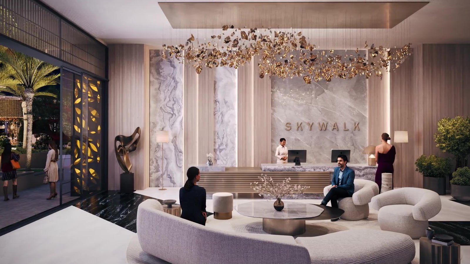 The SKYWALK reception, with the brand name set in marble beneath a sculptural gold chandelier